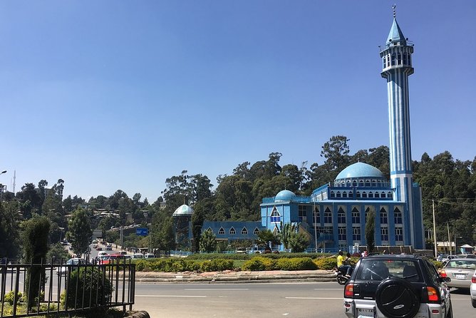 Addis Ababa Guided City Tour With Airport & Hotel Pick Up - Coffee, food, and the human side of the tour