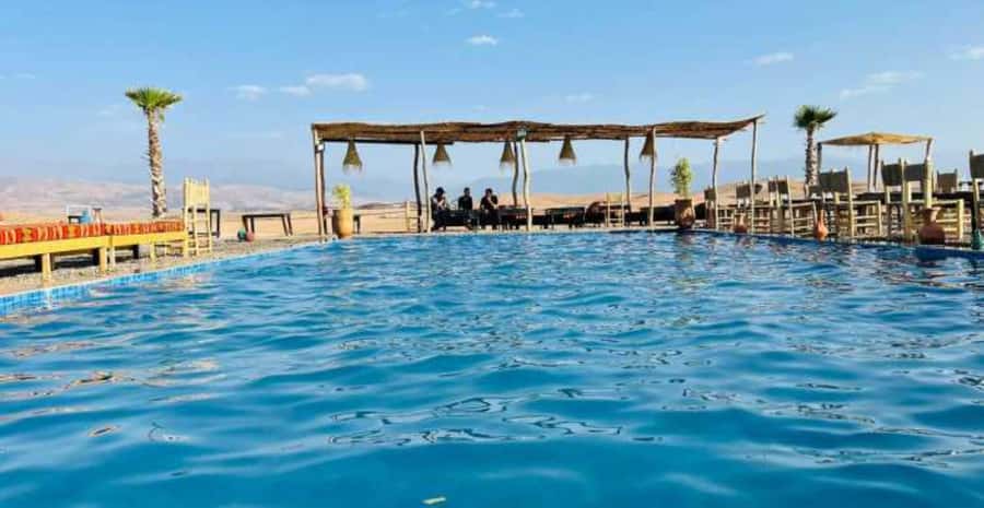 Agafay Desert Day: Quad Bike, Lunch & Swim Adventure - The camel ride adds a slower rhythm