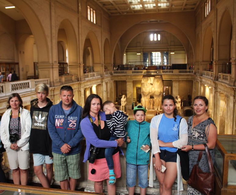 Cairo Day Tour: Pyramids, Museum, Camel Ride & Local Lunch - Standing before the Sphinx