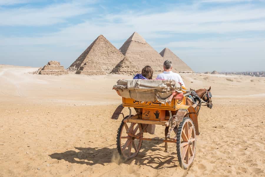 Cairo: Half Day Pyramids Tour by Camel or Horse Carriage - What the guide adds to the day