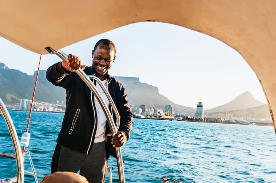 Cape Town: Sunset Catamaran Cruise on Table Bay with Bubbles - Milnerton Lighthouse and the first stretch of coast