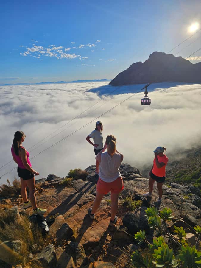 Cape Town: Table Mountain Hike with an Expert Guide - Reaching the top and riding down