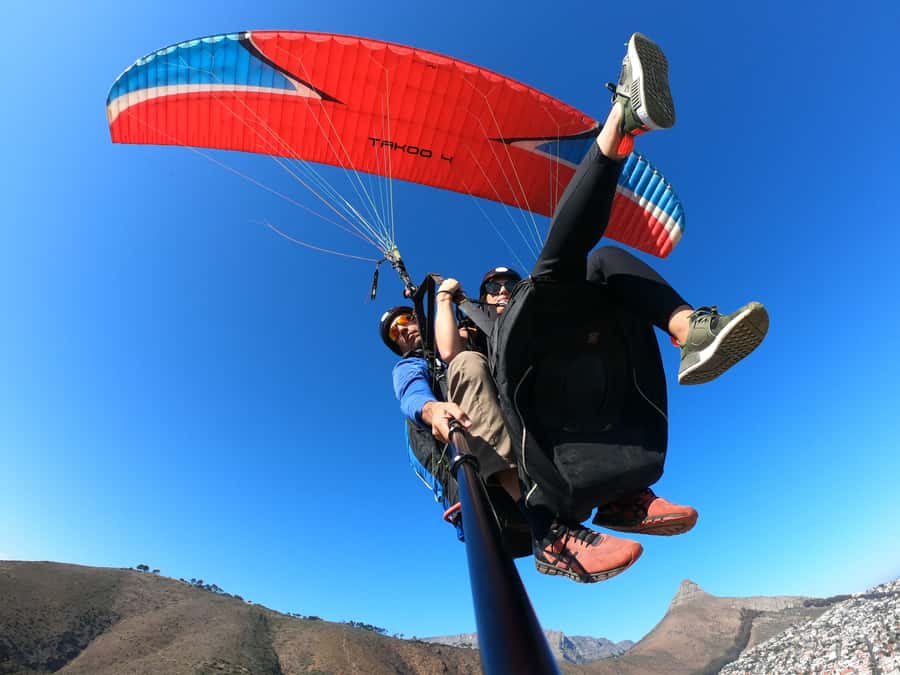 Cape Town: Tandem Paragliding Flight with the Experts - Landing near the ocean and getting back