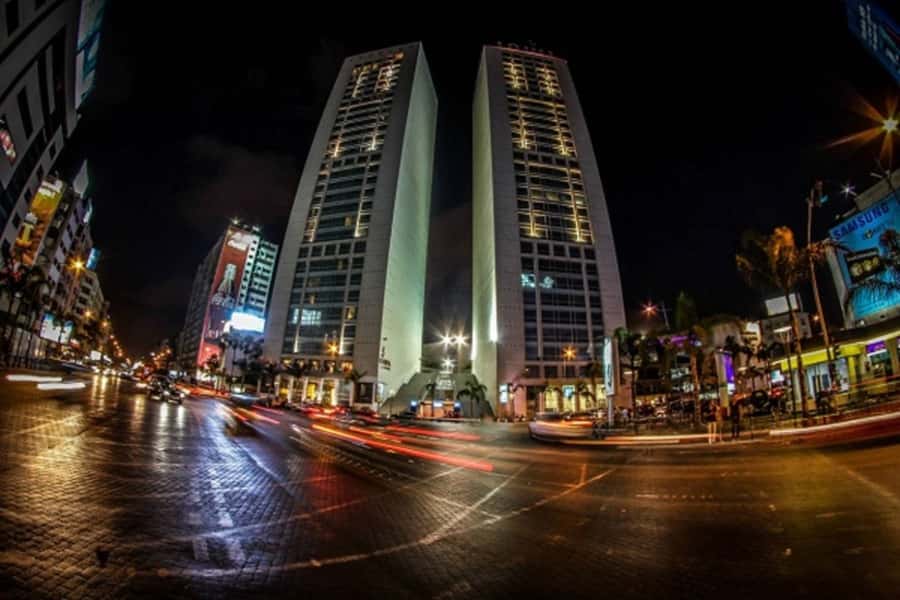 Casablanca City Night Tour and Traditional Moroccan Dinner - The vehicle, guide, and pace