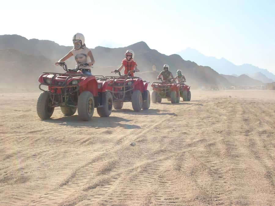 Desert Sunset Quad Bike ATV for 50Km, Oriental Show, Dinner, - A Bedouin Stop With Tea and a Short Camel Ride