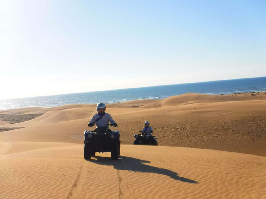 Essaouria: Beach & Big Dunes 2-Hour Quad Biking Tour - Crossing the Oued Ksob toward the Atlantic beach