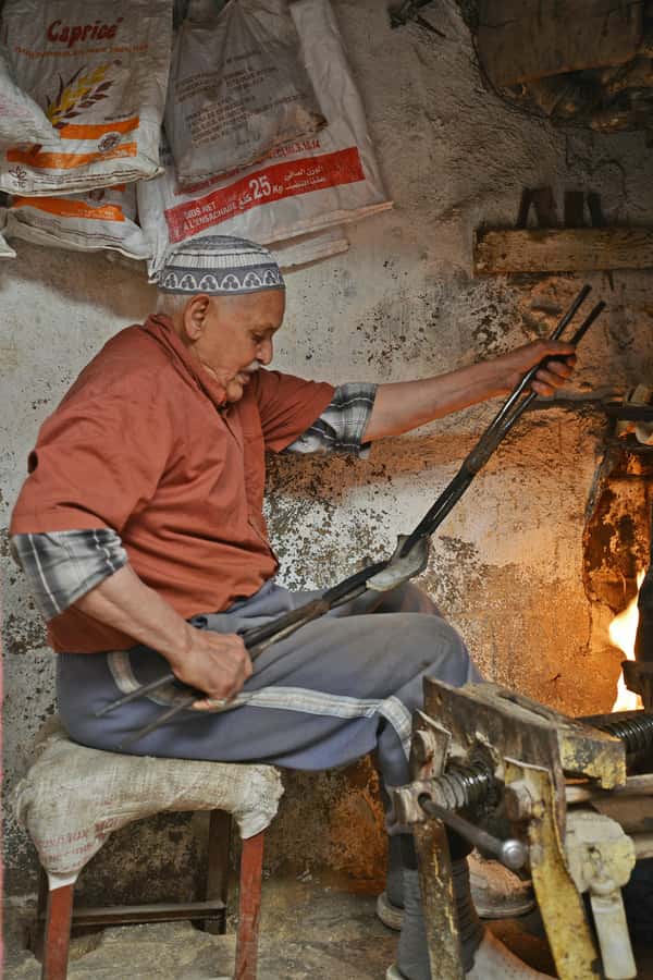 Explore Fes: Unforgettable Guided Walking Tour of the Medina - Nejjarine Fountain, museum, and craft traditions