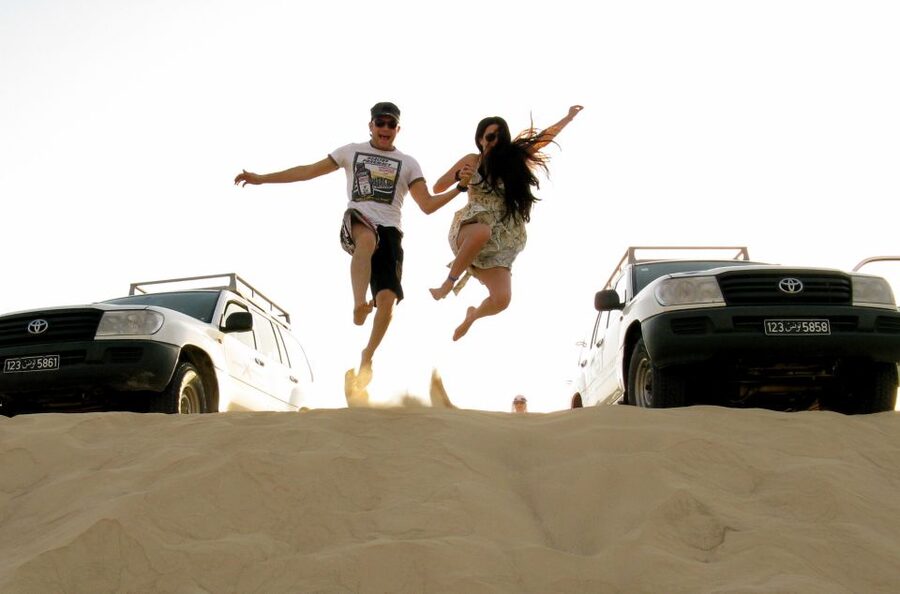 From Agadir/Taghazout: Sahara Sand Dunes with Transfer - Sandboarding and camel rides near the parking area