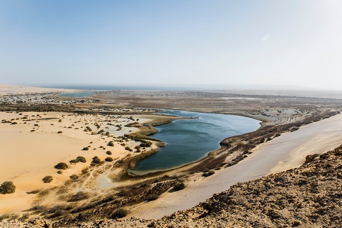 From Cairo: Desert Safari, Waterfalls, Sand boarding and Camel ride with Lunch - Dune bashing in a 4x4