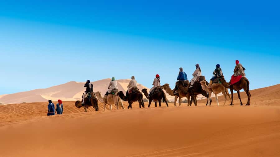 From Fes: 2-Day Luxury Desert Tour to Marrakech & Back Fez - Arriving at Erg Chebbi and riding into the dunes