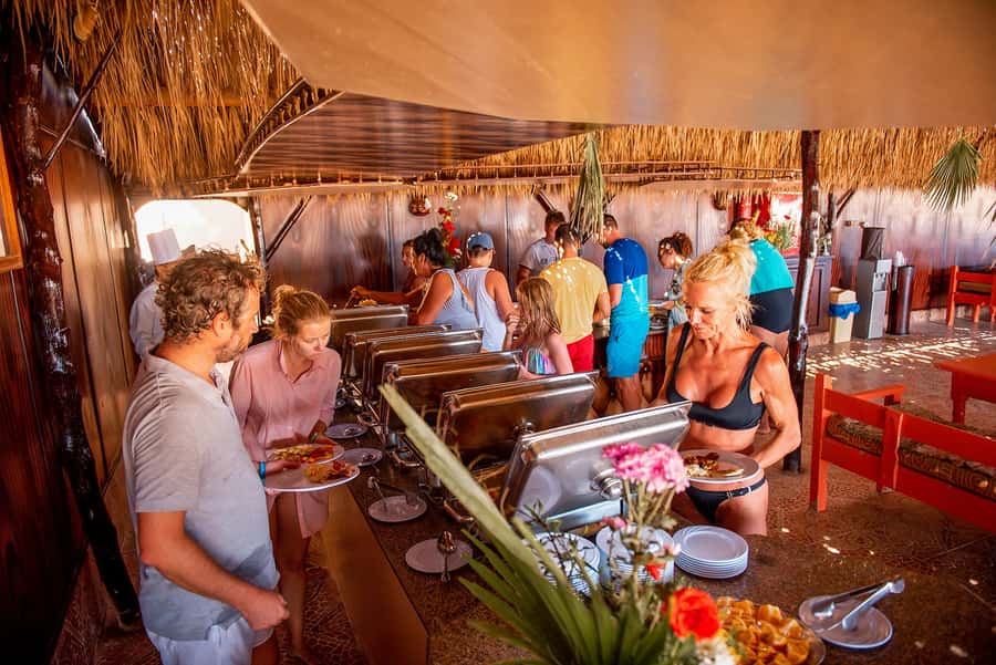 From Hurghada: Paradise Island Snorkeling Cruise with Lunch - Beach time, water sports, and the island atmosphere