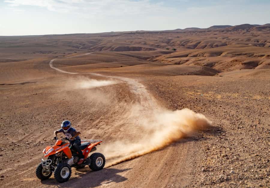 From Marrakech: Agafay Desert Dinner with Quad & Camel Ride - Music, fire, and the night sky