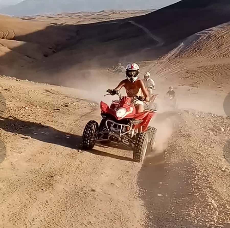 From Marrakech: Agafay Desert Quad Biking Tour with Transfer - Safety briefing, helmets, and your first ride