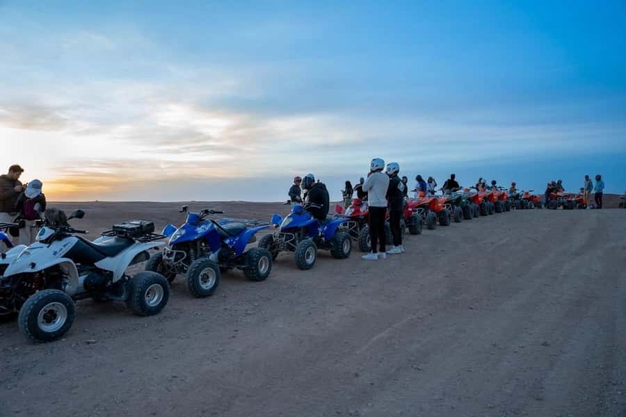 From Marrakech: Agafay Desert Quad Biking with Dinner & Show - The camel ride and traditional photo stop