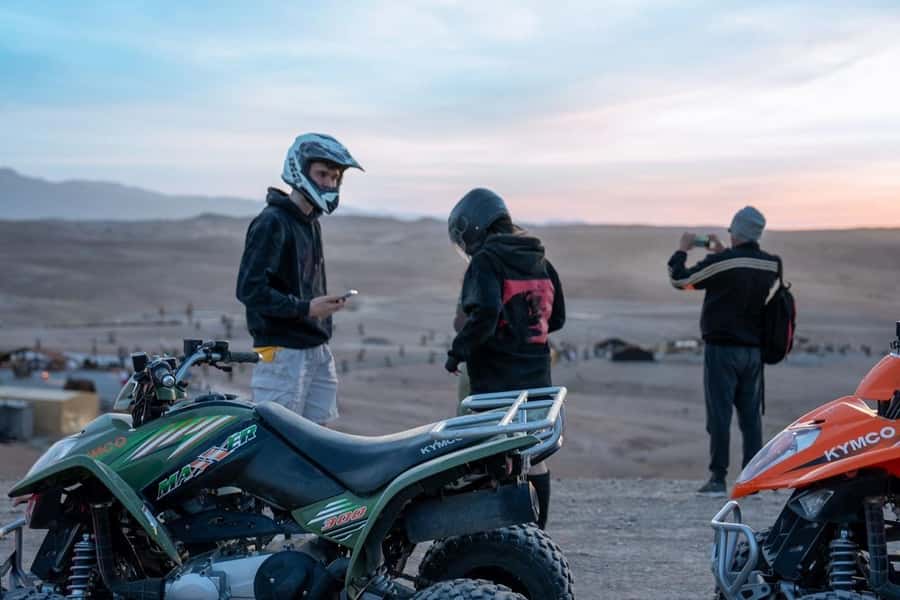 From Marrakech: Agafay Desert Quad Biking with Dinner & Show - Campfire music and the fire show