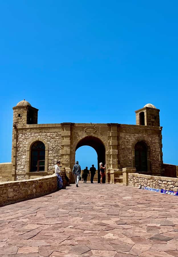 From Marrakech: Essaouira Day Trip with Hotel Pickup - The fishing port and a practical seafood lunch