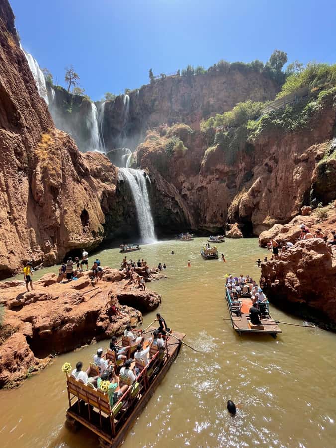 From Marrakech: Ouzoud Waterfalls Guided Hike and Boat Trip - The short boat ride beneath the falls