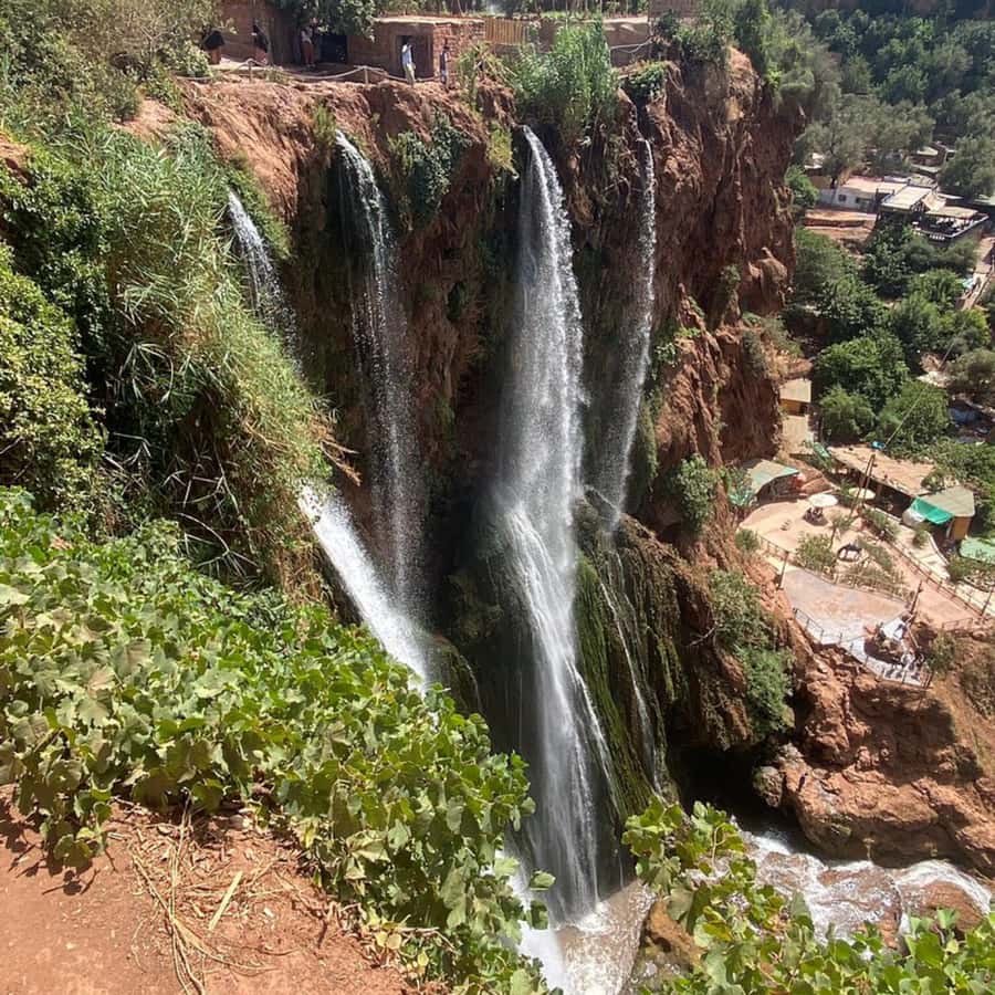 From Marrakech: Ouzoud Waterfalls Guided Tour and Boat Ride - The optional boat ride below the cascades