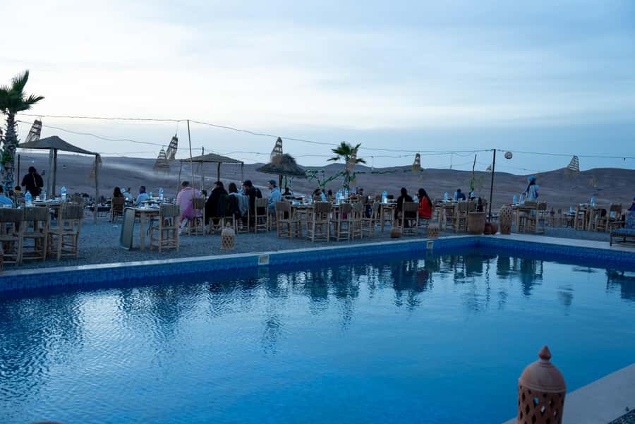 From Marrakech: Sunset Desert Tour with Camel Ride & Dinner - Reaching the Agafay Desert from Marrakech