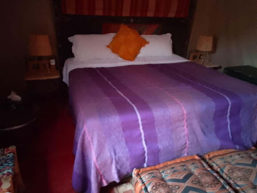From Merzouga: Overnight Camel Trek over Erg Chebbi Dunes - Riding over Erg Chebbi at sunset