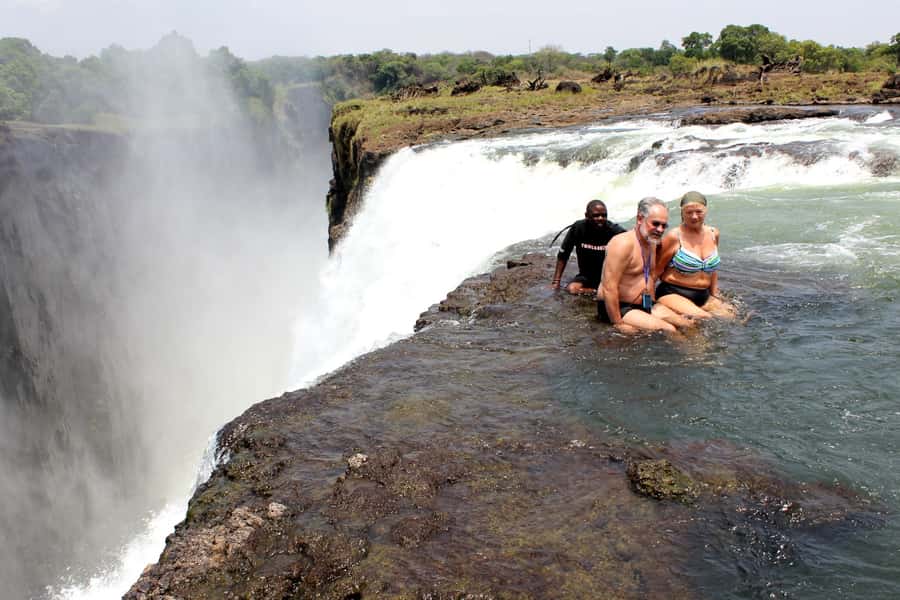 From Victoria Falls: Livingstone Island Tour & Devils Pool - Who should book this experience?