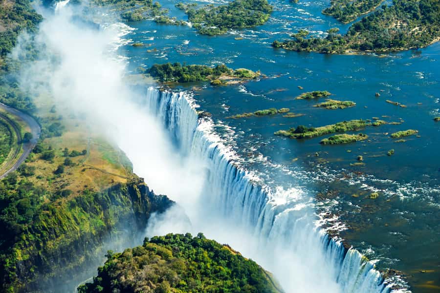 From Victoria Falls: Livingstone Island Tour & Devils Pool - Crossing from Victoria Falls to the Zambian side