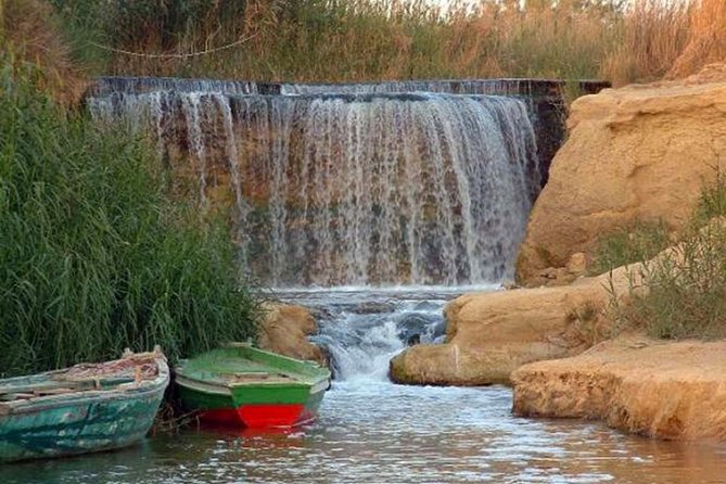 Full-Day Fayoum Oasis and Waterfalls of Wadi El-Rayan Tour from Cairo - A traditional felucca, with weather as the boss
