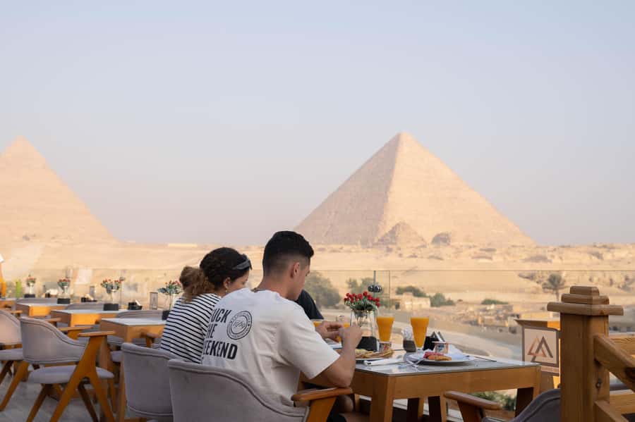 Giza: Dinner with Pyramids All Around You at Rooftop7000 - What the 45-minute return ride adds