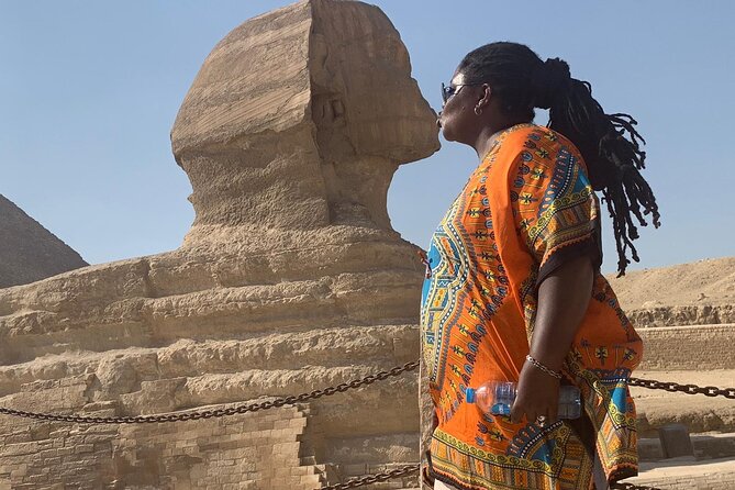 Giza Pyramids, Ride a Camel, Sphinx, Egyptian Museum& Bazaar, Lunch is included. - Seeing the three pyramids at Giza