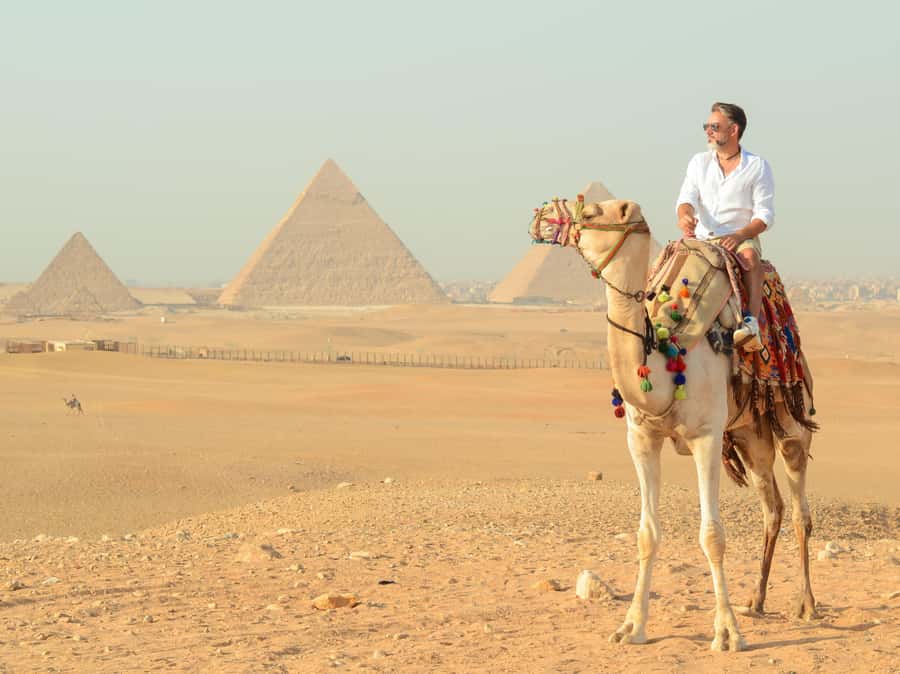 Giza Sunrise Pyramid Guided Tour With Camel Ride & Breakfast - Why the 5 AM start is worth it