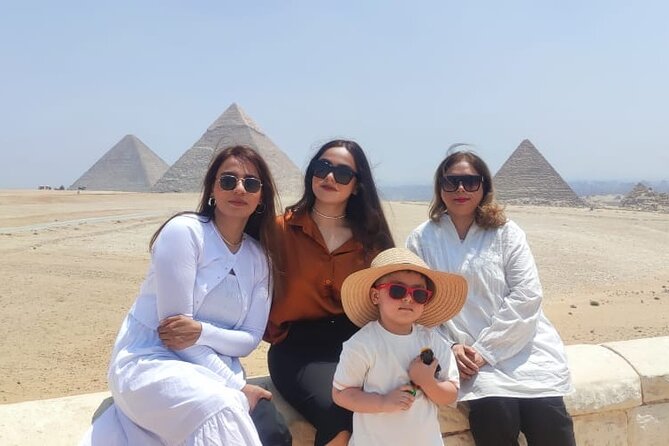 Guided Tour to Giza Pyramids ,Sphinx, Camel & inside the pyramids - A four-hour introduction to ancient Giza