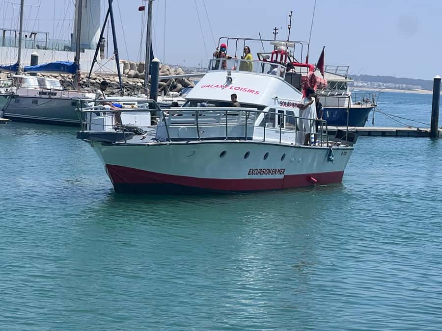 Half-Day Boat Trip in Agadir: Fishing, Fish BBQ & Swimming - Leaving the marina with mountain views
