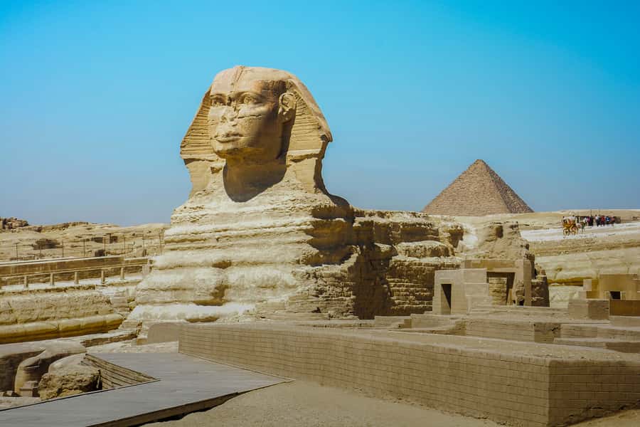 Half-Day Cairo Sightseeing Tour to Pyramids of Giza & Sphinx - The Great Sphinx and the face of a pharaoh