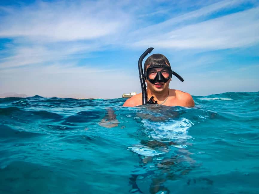 Hurghada: Dolphin & Coral Reef Snorkeling Tour with Lunch - Giftun Island adds scenery, not necessarily more snorkeling