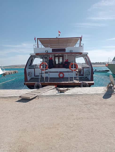 Hurghada: Dolphin & Coral Reef Snorkeling Tour with Lunch - Lunch, drinks, and the pace of the boat