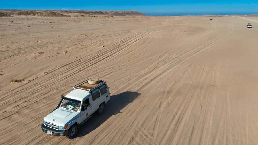 Hurghada: Jeep Safari with Camel Ride, Dinner and Show - Returning through the desert at sunset