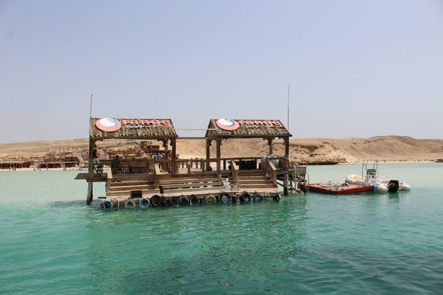 Hurghada: Orange Bay Snorkeling with Lunch & Optional Diving - Orange Bay, coral water, and a choice of boats