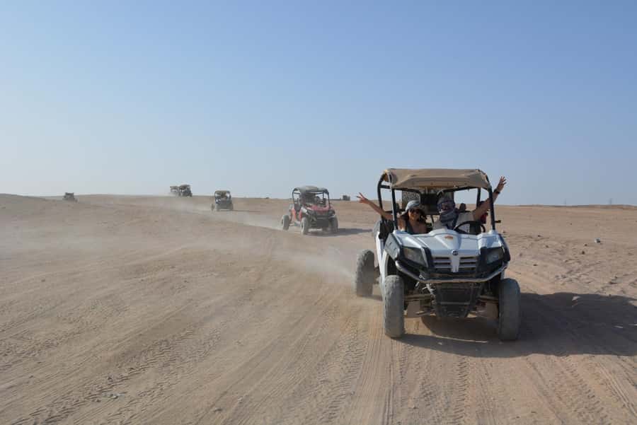 Hurghada: Quad and Buggy Safari with Dinner and Show - Sunset from the desert rooftop