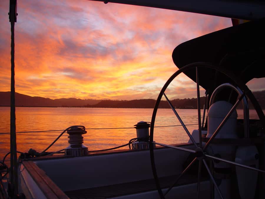 Knysna Sunset Sailing Cruise with Light Dinner and Wine - Sailing Out on Outeniqua from Knysna Waterfront