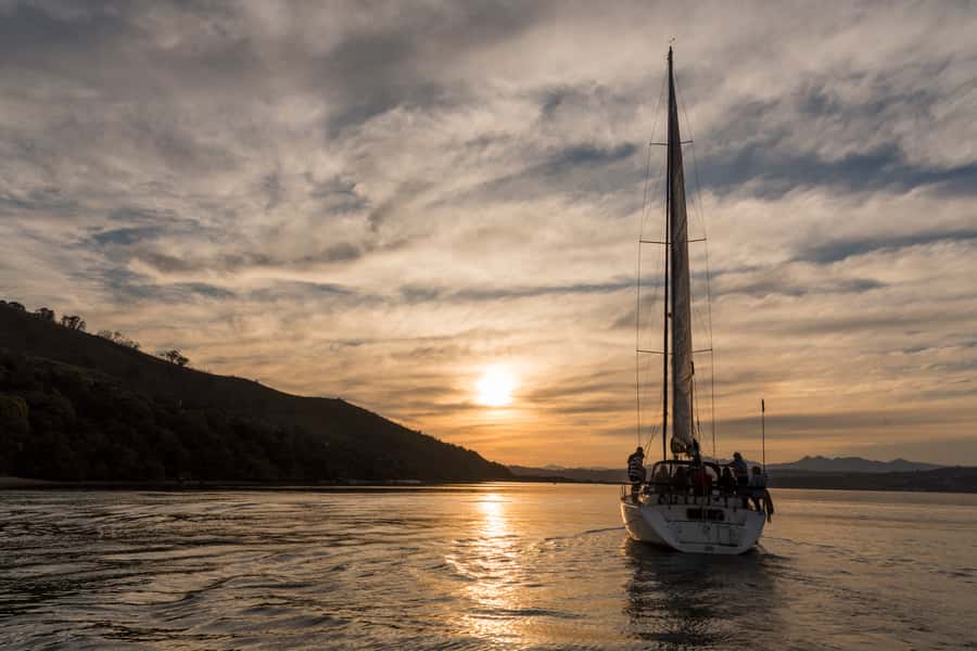 Knysna Sunset Sailing Cruise with Light Dinner and Wine - Sunset, Cap Classique, and the evening spread
