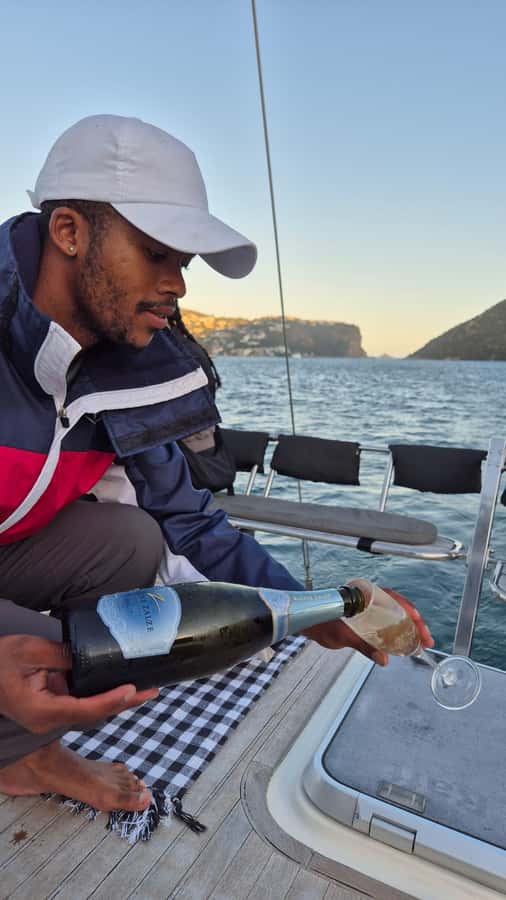 Knysna Sunset Sailing Cruise with Light Dinner and Wine - What the crew adds to the experience
