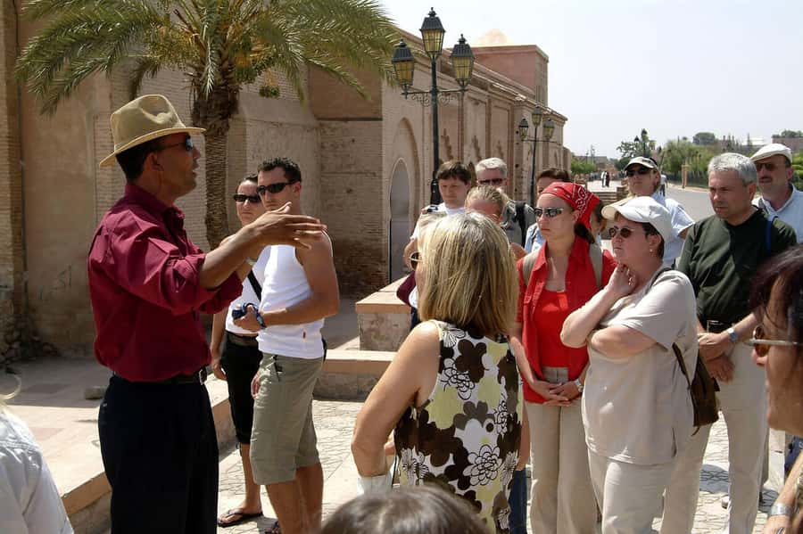 Marrakech: 3-Hour Monuments, Souks & Old Medina Walking Tour - Walking through the Medina’s working quarters
