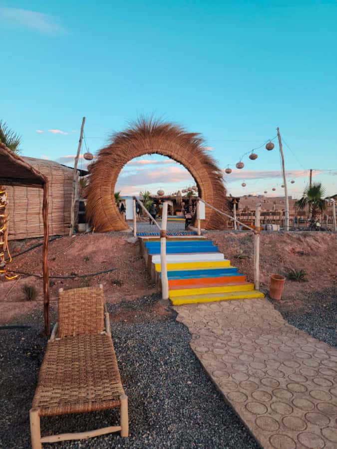 Marrakech: Agafay Camel Ride & Dinner with Fire Show Tour - From Marrakech streets to Agafay stone