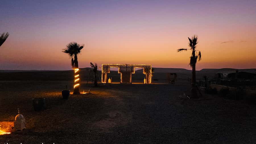 Marrakech: Agafay Camel Ride & Dinner with Fire Show Tour - The desert pool is more than a quick photo stop
