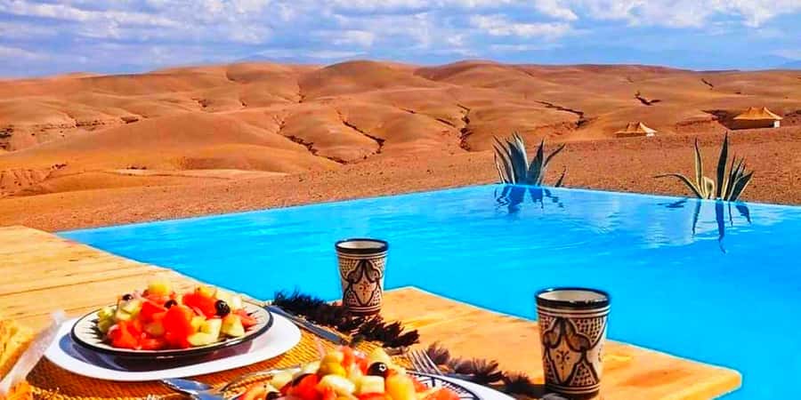 Marrakech: Agafay Desert Camp Lunch with Camel Ride and Pool - Transport, guides, and the real timing