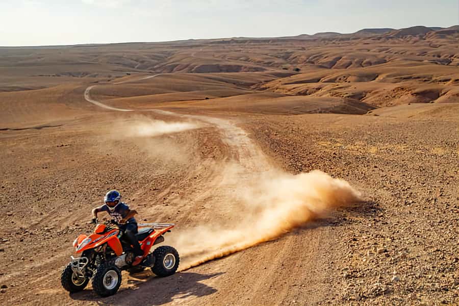Marrakech: Agafay Desert Dinner Show with Quad Bike & Camel - Quad Biking Across the Agafay Terrain