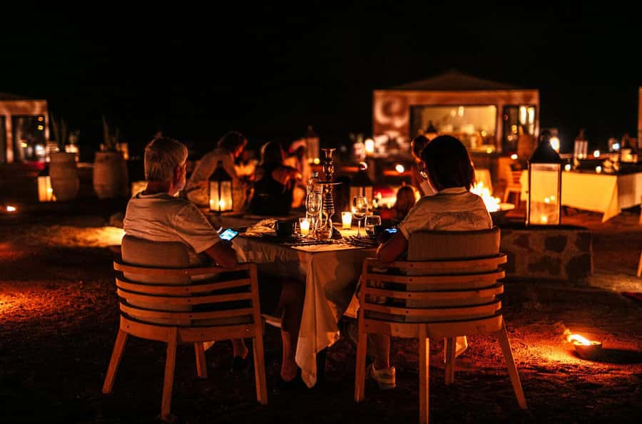 Marrakech: Agafay Desert Dinner Show with Sunset Camel Ride - Dinner under the tent canopy