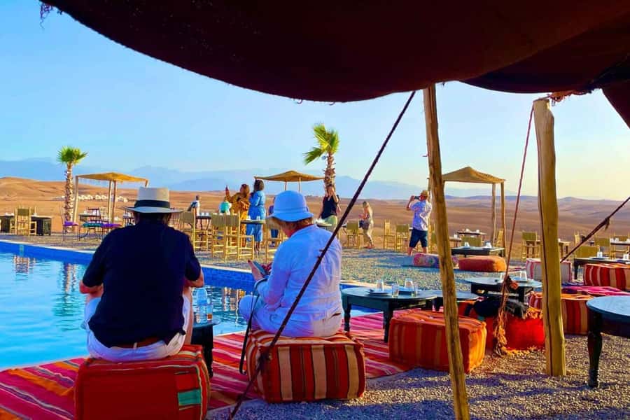 Marrakech: Agafay Desert Quad Biking & Dinner Show - Sharing the quad across rocky ground