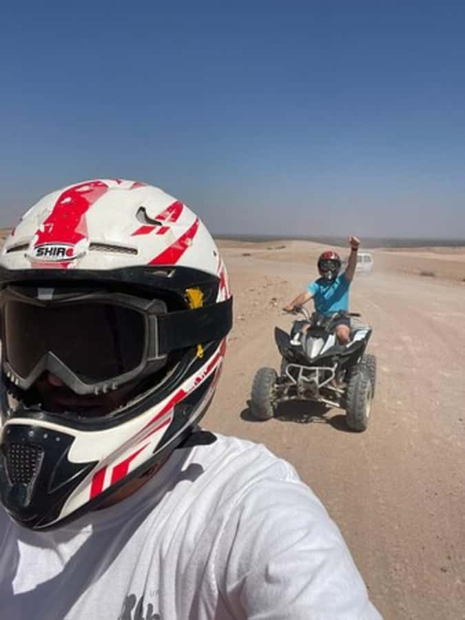Marrakech: Agafay Desert Quad Biking with Dinner Show - Music, dancing, Gnawa rhythms, and the fire show
