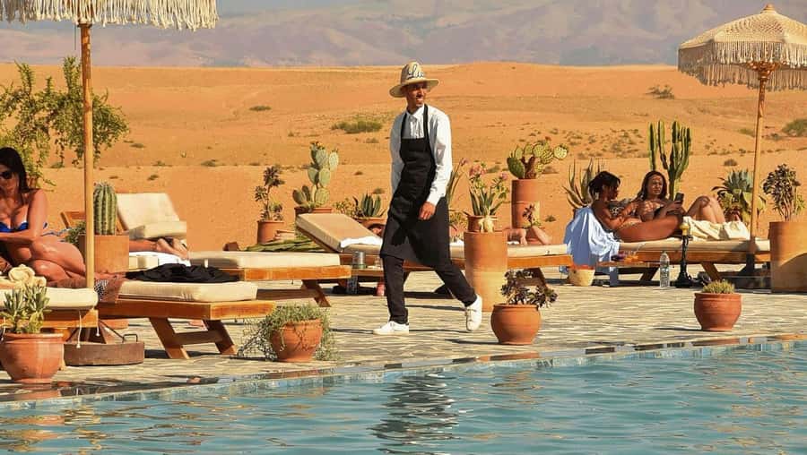 Marrakech: Agafay Desert Quad Camel Rides, Pool, Dinner Show - Cooling off in a desert pool